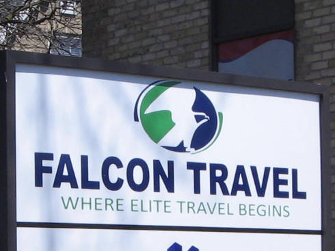 [Falcon Travel sign]